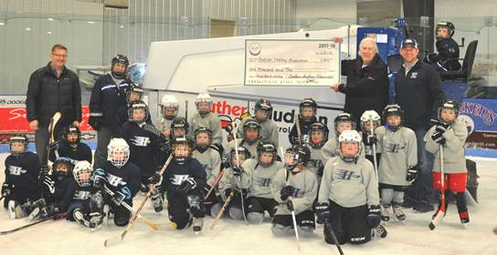 Hudson Chev hockey check.jpg