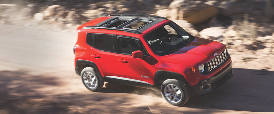 Jeep Renegade A Jeep Renegade driving through a desert