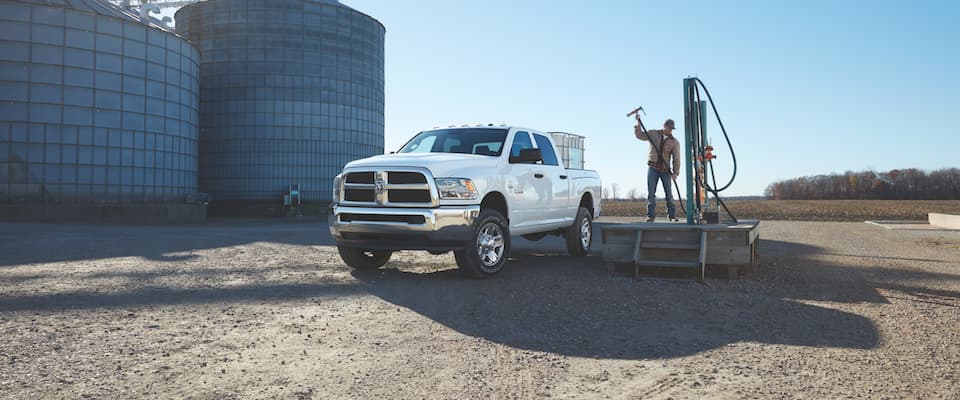 2018 Ram 2500 A white 2018 Ram 2500 parked on a job site