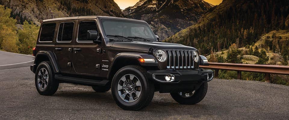 2019 Jeep Wrangler A 2019 Jeep Wrangler parked in front of the mountains at sunset