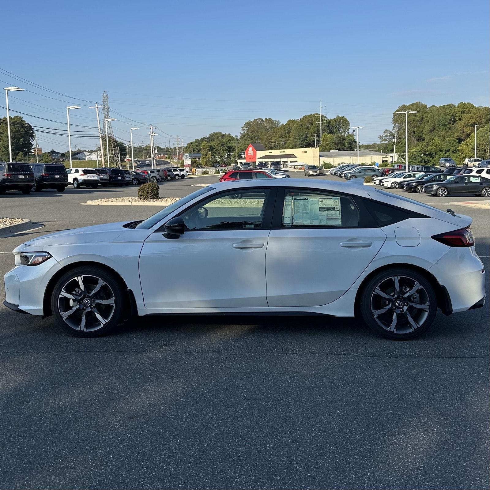 2026 Honda Civic Hatchback Hybrid Sport Touring photo 2