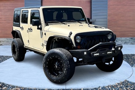 2011 Jeep Wrangler Unlimited Sport SUV 4D SUV