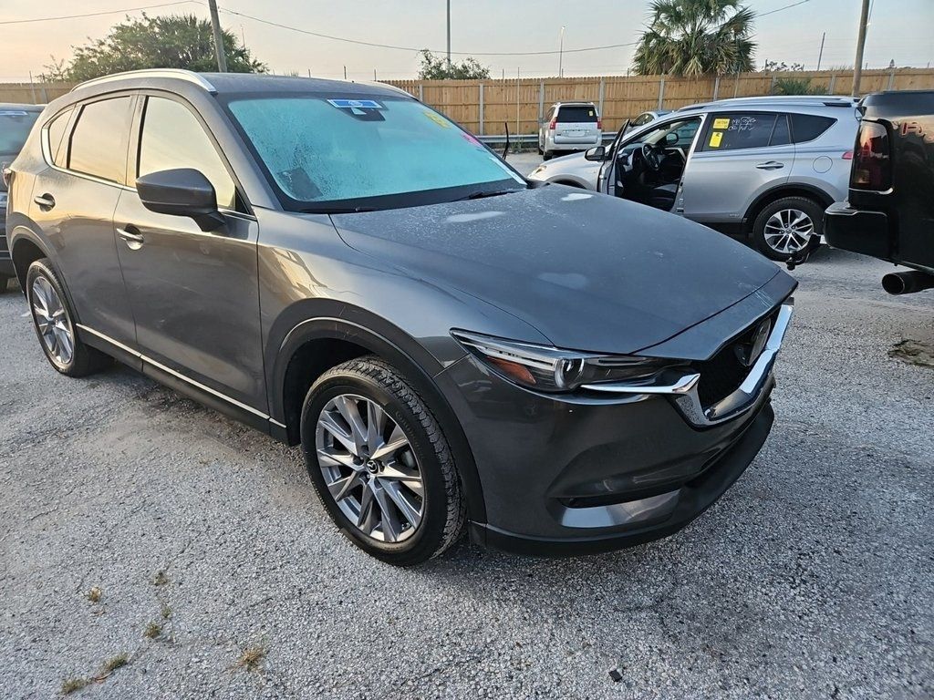 Used 2020 Mazda CX-5 Grand Touring with VIN JM3KFADM5L0757076 for sale in Marion, IA