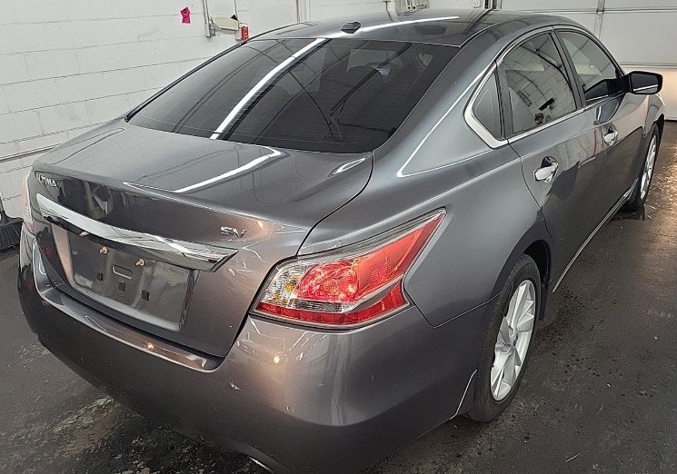 Used 2015 Nissan Altima SV with VIN 1N4AL3AP6FC250767 for sale in Marion, IA