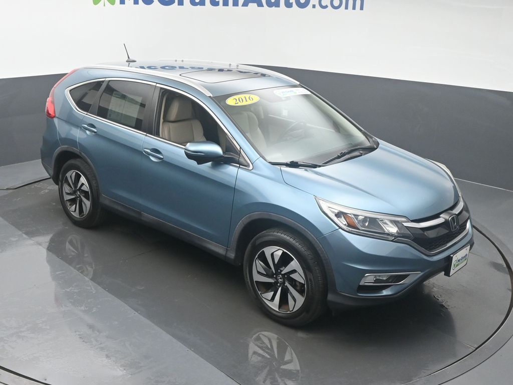 Used 2016 Honda CR-V Touring with VIN 5J6RM4H94GL006442 for sale in Marion, IA