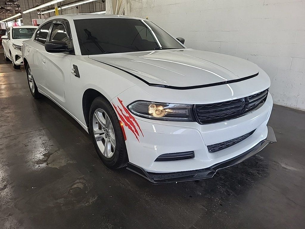 Used 2021 Dodge Charger SXT with VIN 2C3CDXBG3MH638821 for sale in Marion, IA