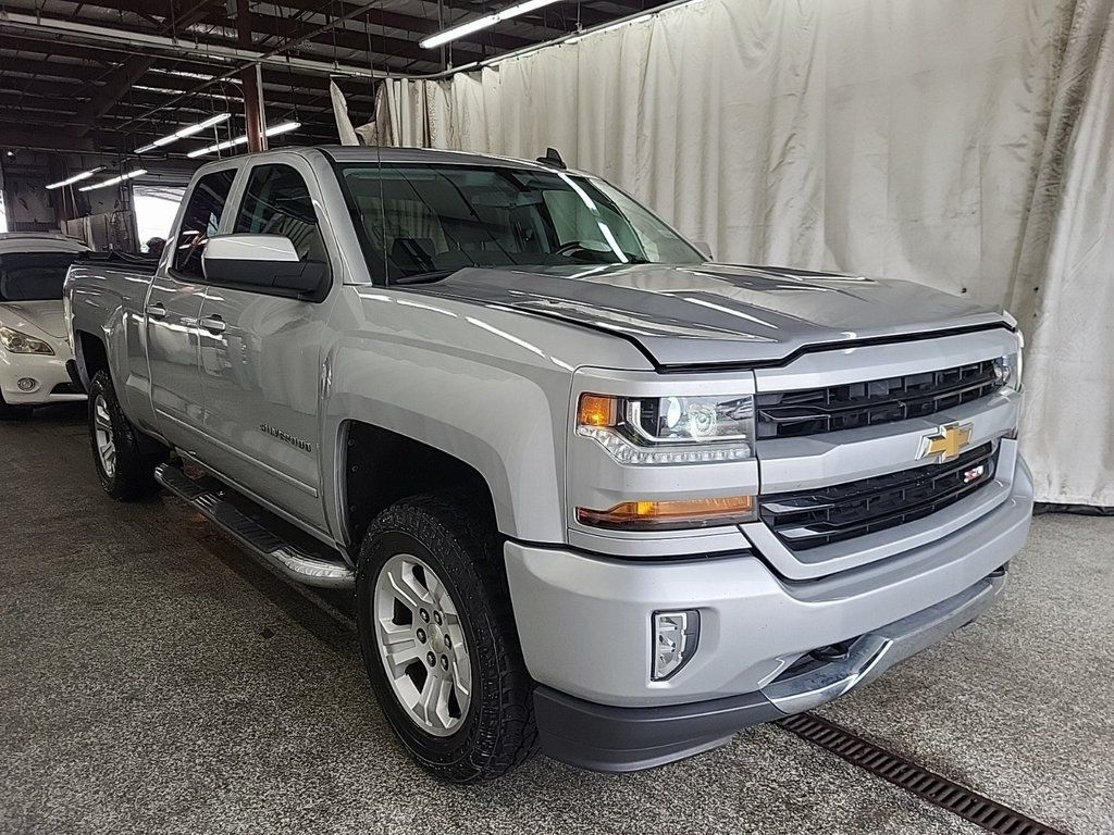 Used 2018 Chevrolet Silverado 1500 LT Z71 with VIN 1GCVKREC6JZ232543 for sale in Marion, IA