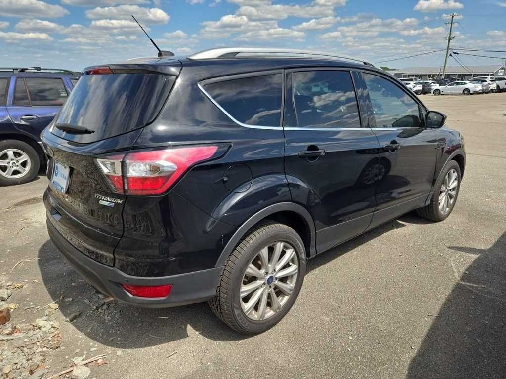 Used 2017 Ford Escape Titanium with VIN 1FMCU9JD6HUB27651 for sale in Marion, IA
