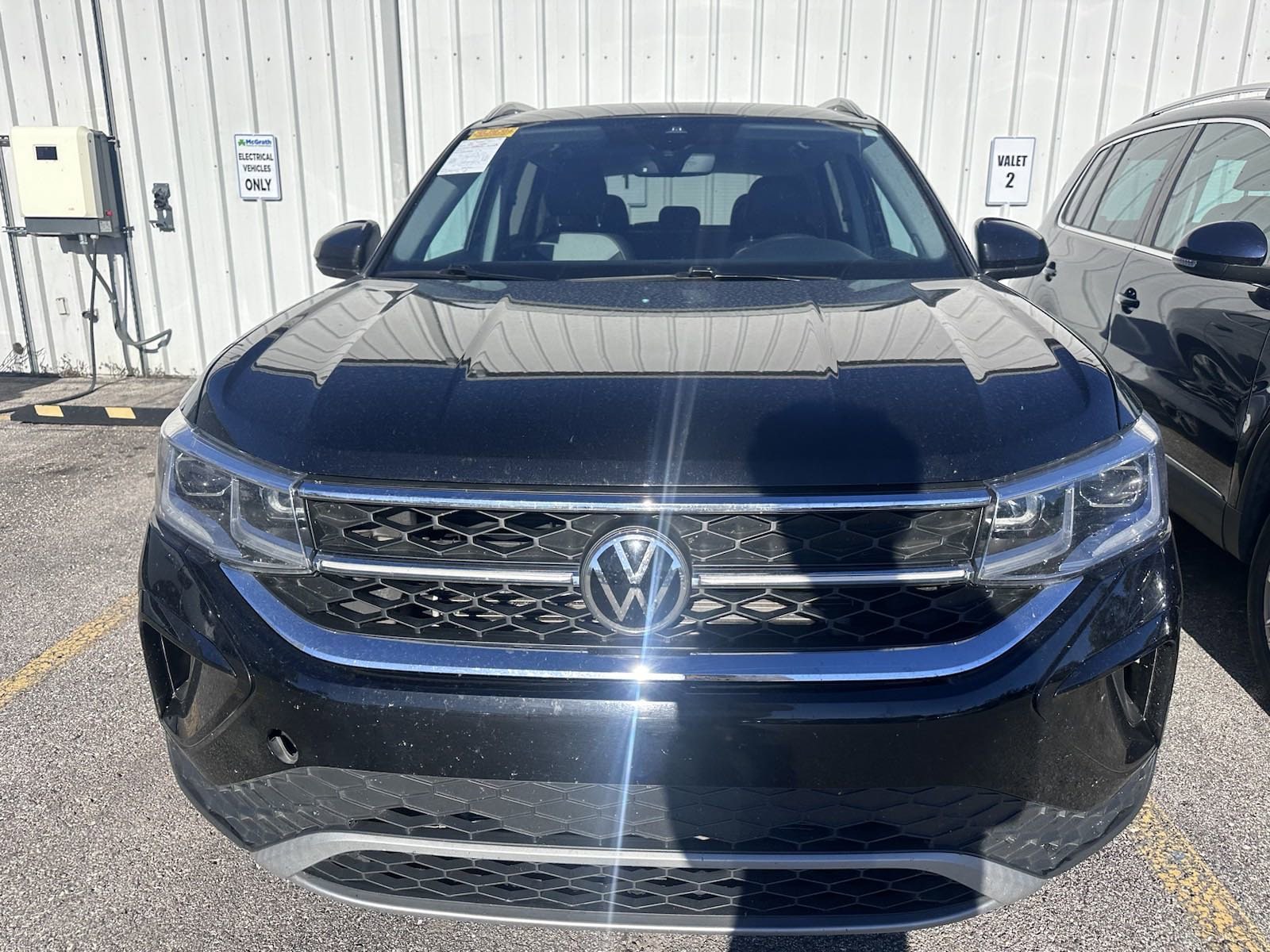 Used 2022 Volkswagen Taos SEL with VIN 3VV2X7B21NM050584 for sale in Marion, IA