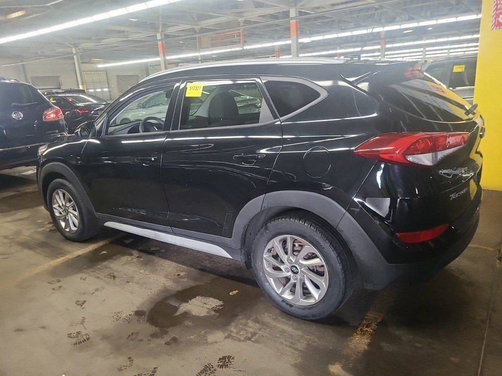 Used 2017 Hyundai Tucson SE with VIN KM8J3CA42HU524670 for sale in Marion, IA