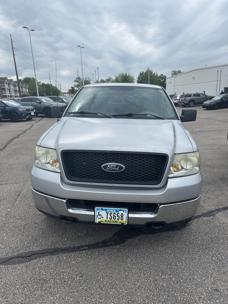 Used 2005 Ford F-150 XLT with VIN 1FTPX14565NB15413 for sale in Marion, IA