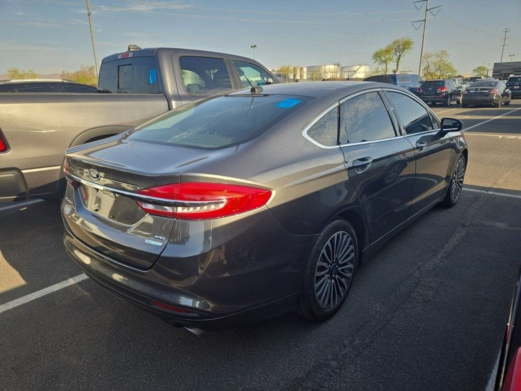Used 2018 Ford Fusion SE with VIN 3FA6P0HD7JR225004 for sale in Marion, IA