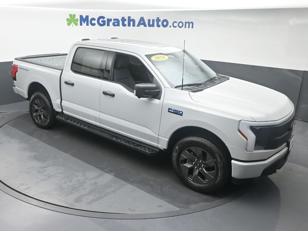 Used 2024 Ford F-150 Lightning XLT with VIN 1FTVW3LK1RWG14276 for sale in Marion, IA