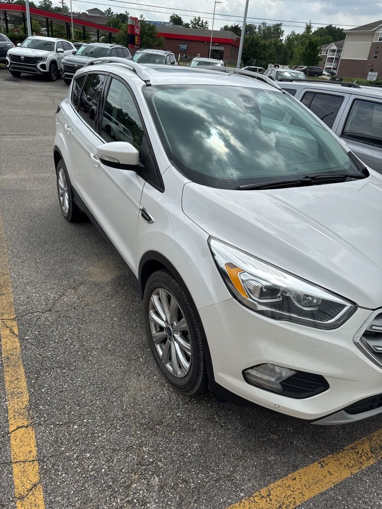 Used 2017 Ford Escape Titanium with VIN 1FMCU9J91HUA58766 for sale in Marion, IA