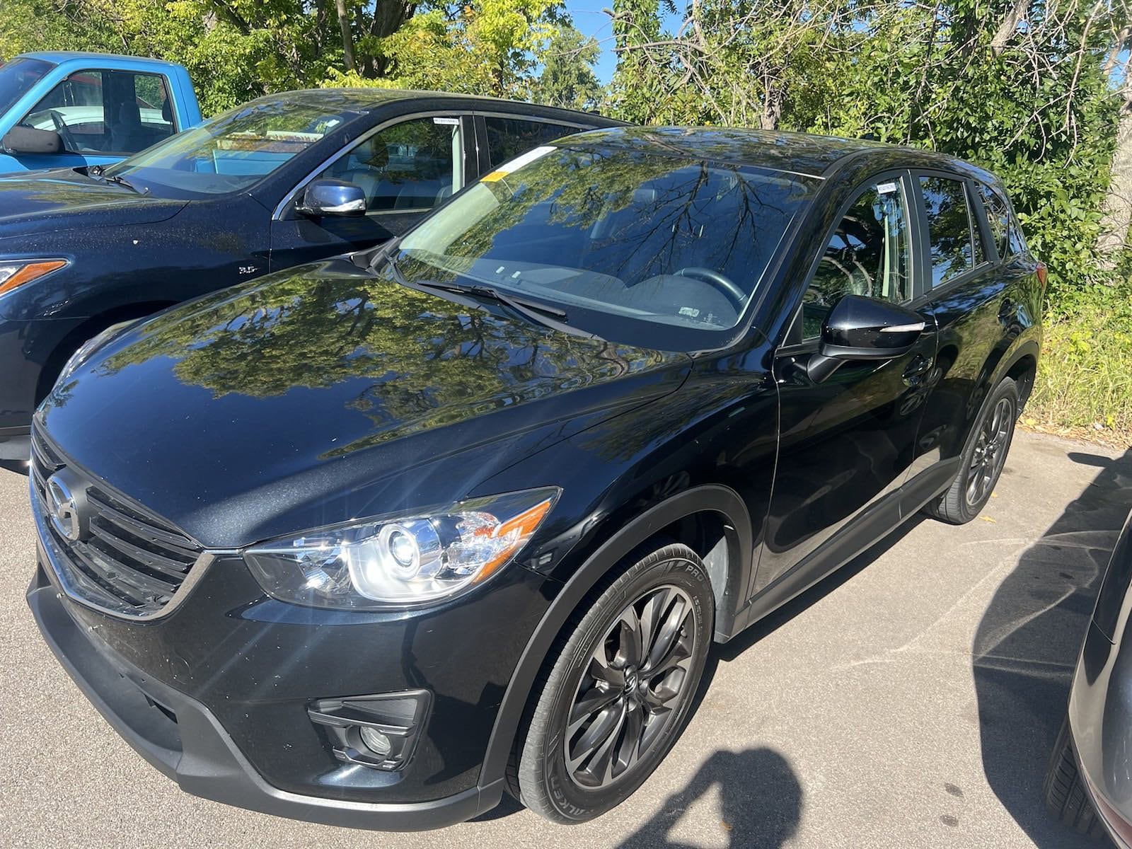 Used 2016 Mazda CX-5 Grand Touring with VIN JM3KE4DY3G0883417 for sale in Marion, IA