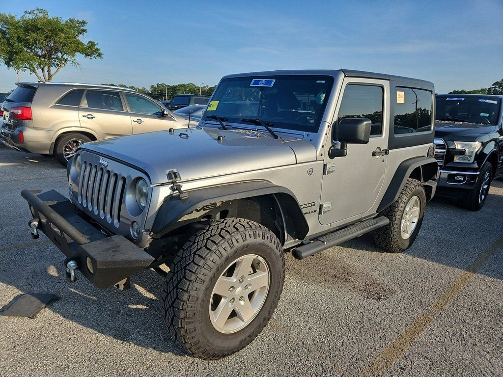 Used 2015 Jeep Wrangler Sport with VIN 1C4AJWAG8FL520082 for sale in Marion, IA