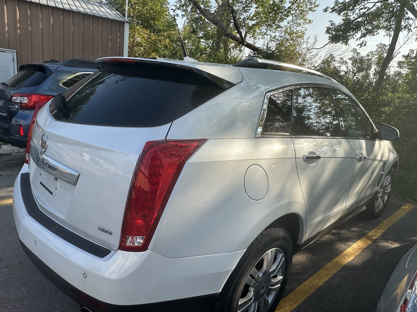 Used 2012 Cadillac SRX Luxury Collection with VIN 3GYFNDE36CS575037 for sale in Marion, IA