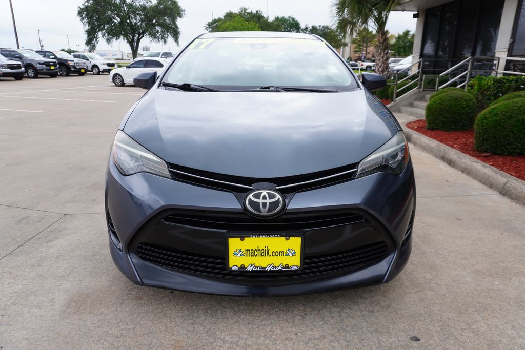 Used 2017 Toyota Corolla LE with VIN 5YFBURHE7HP675802 for sale in Pasadena, TX