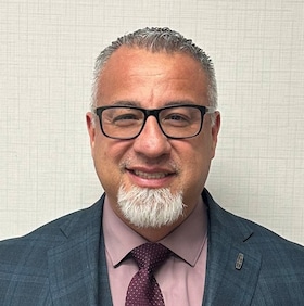 Staff member Milo Reyna from 221adb76793a