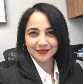 Staff member Olga Espinosa from 11f8b8e1dd56