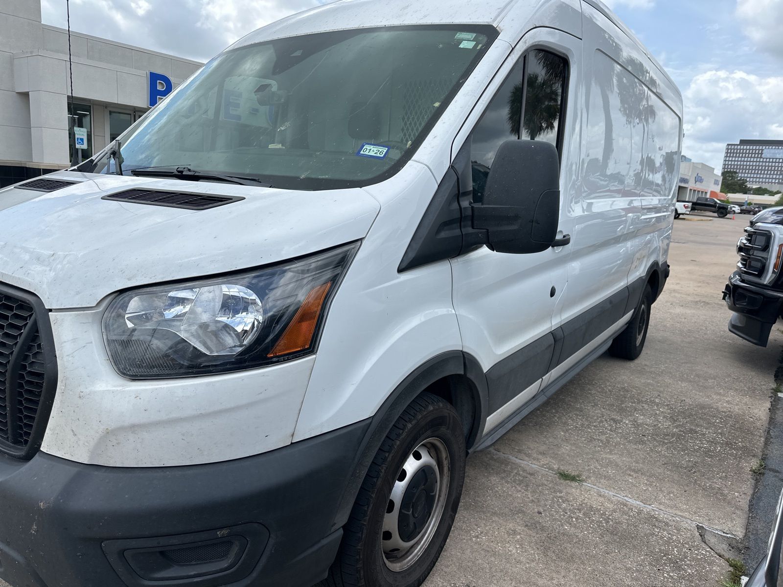 2023 Ford Transit 150 Med Roof 148 WB's photo
