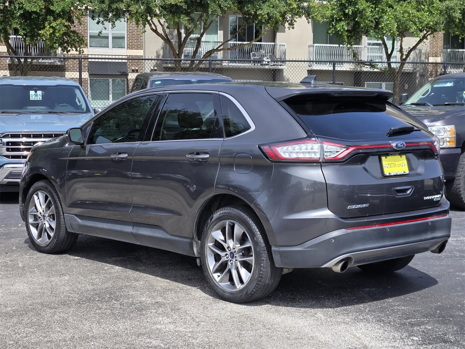 Used 2015 Ford Edge Titanium with VIN 2FMPK3K90FBC06881 for sale in Houston, TX