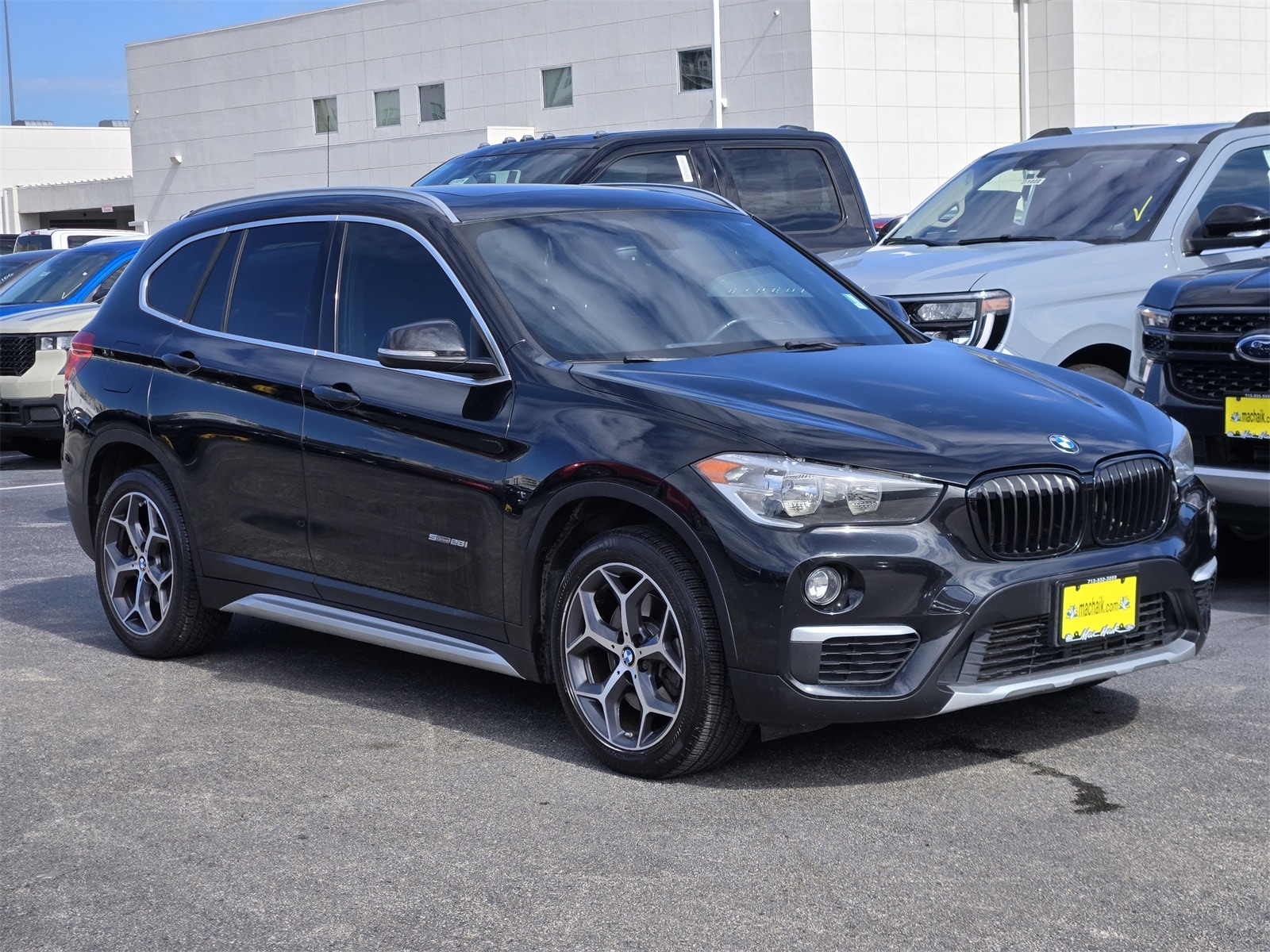 Used 2018 BMW X1 28i with VIN WBXHU7C30J5L05298 for sale in Houston, TX