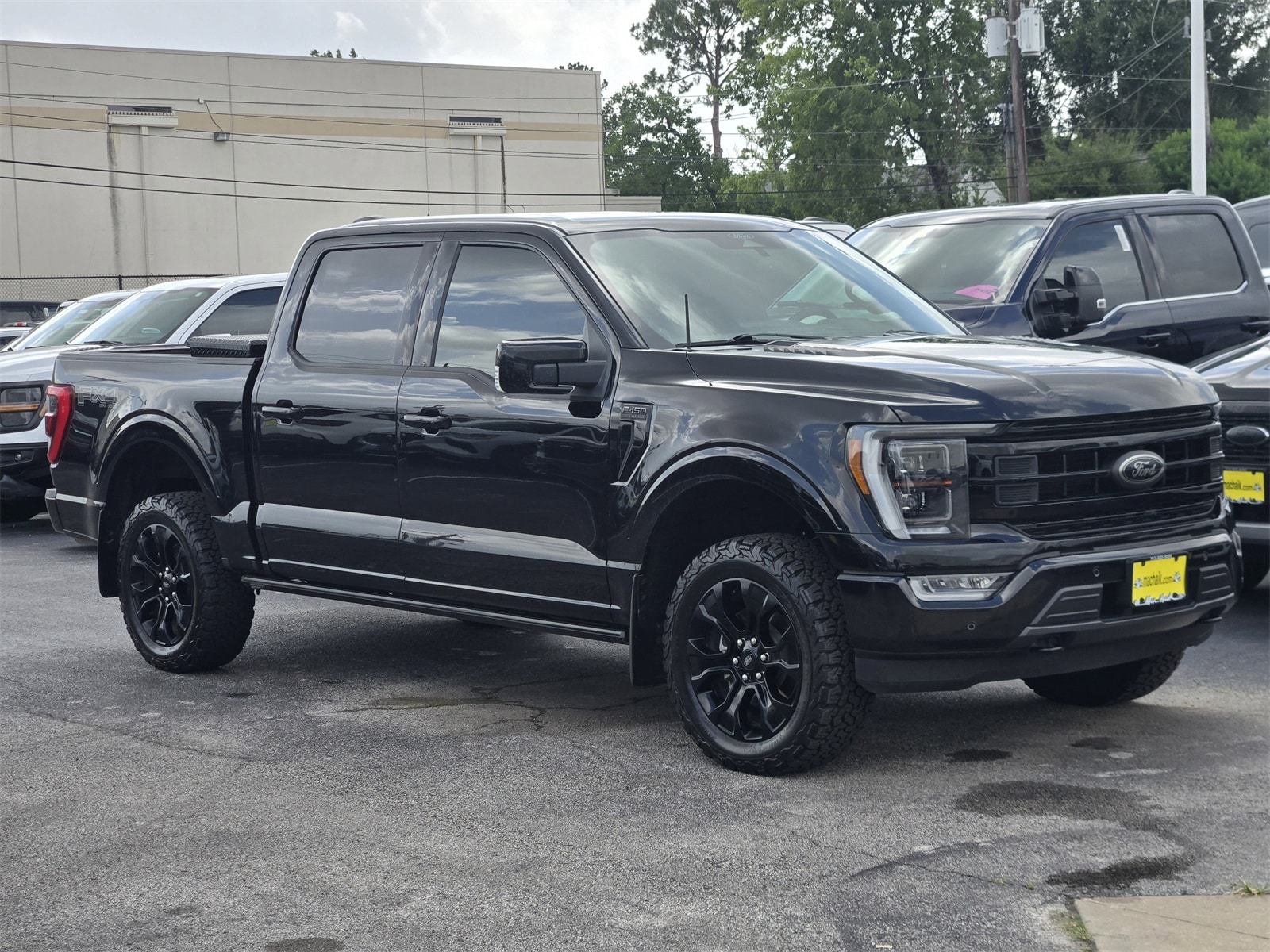 Used 2022 Ford F-150 Lariat with VIN 1FTFW1E84NFB55815 for sale in Houston, TX