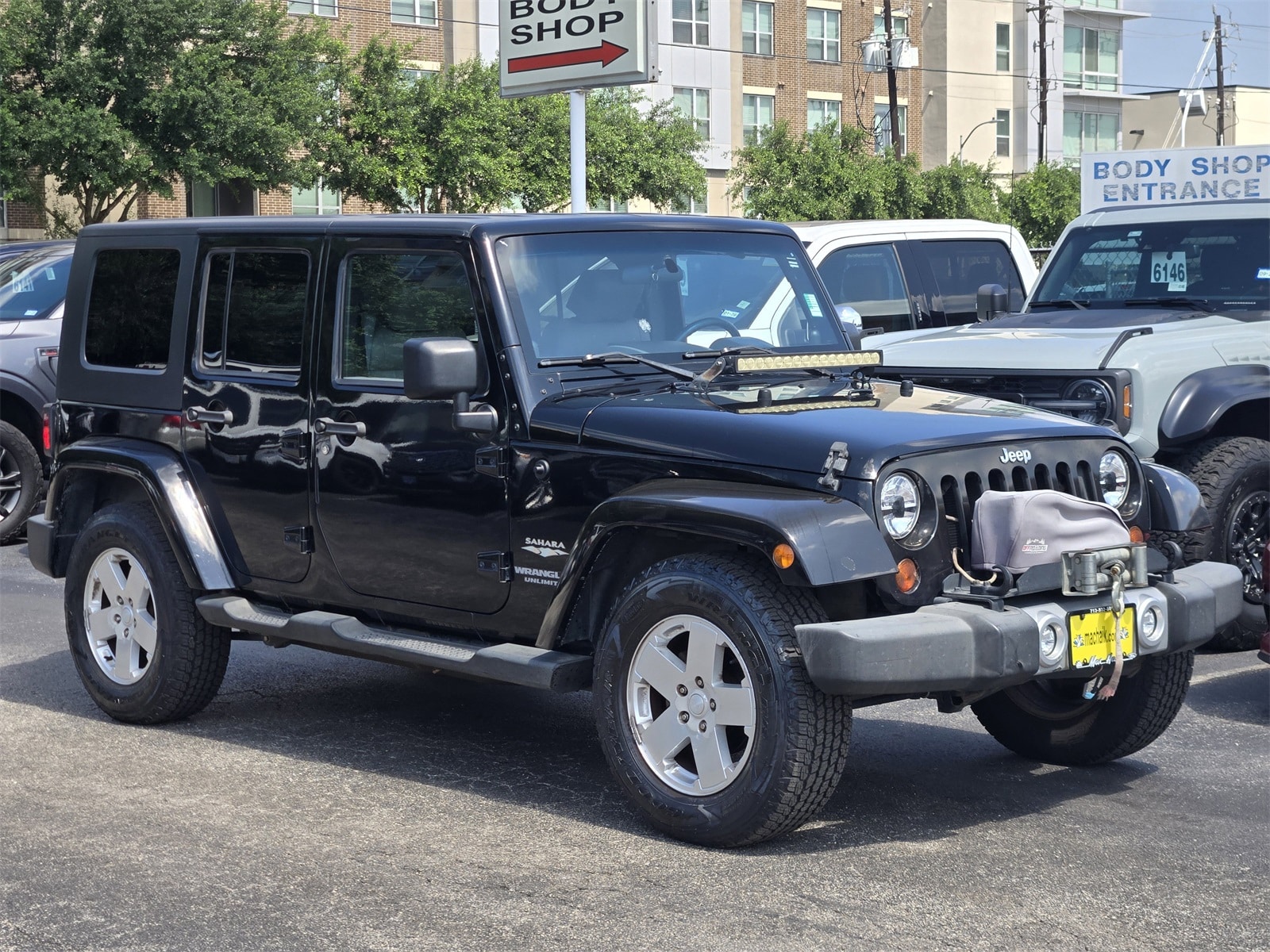 Used 2010 Jeep Wrangler Unlimited Sahara with VIN 1J4HA5H13AL221368 for sale in Houston, TX