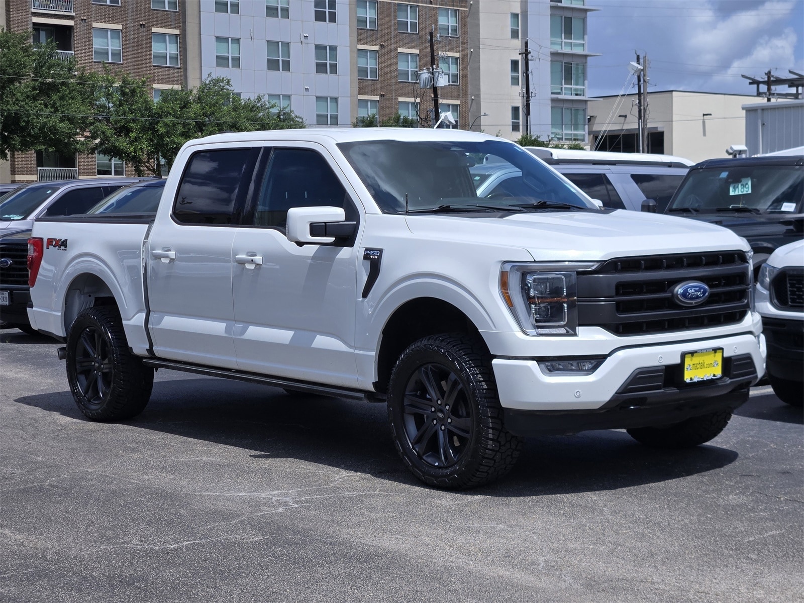 Used 2023 Ford F-150 Lariat with VIN 1FTFW1E84PFC16860 for sale in Houston, TX