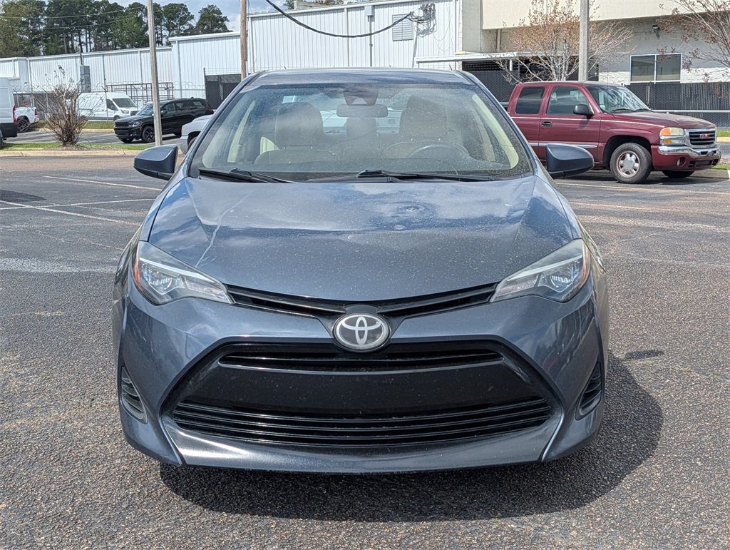 Used 2019 Toyota Corolla LE with VIN 2T1BURHE2KC206883 for sale in Flowood, MS