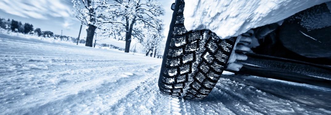 bigstock-Car-tires-on-winter-road-103356746-e1513195514274.jpg