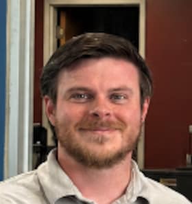Staff member Mike McLaughlin  from ID_93836ecd9033