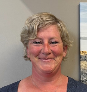 Staff member Kate Cornell  from ID_93836ecd9033