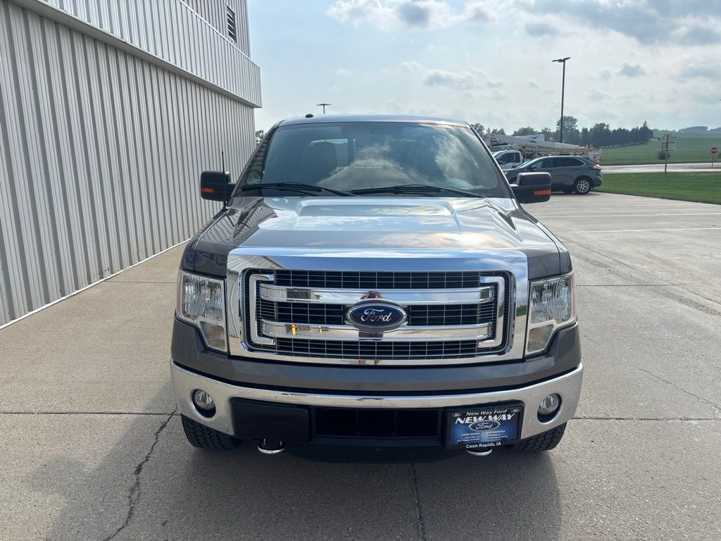 Used 2014 Ford F-150 XLT with VIN 1FTFW1ET2EKD72873 for sale in Coon Rapids, IA