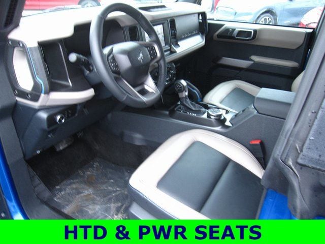 Used 2023 Ford Bronco 4-Door Wildtrak with VIN 1FMEE5DP9PLC05347 for sale in Madelia, Minnesota