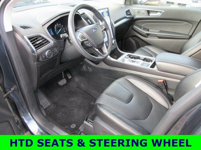 Used 2022 Ford Edge Titanium with VIN 2FMPK4K91NBB11542 for sale in Madelia, Minnesota