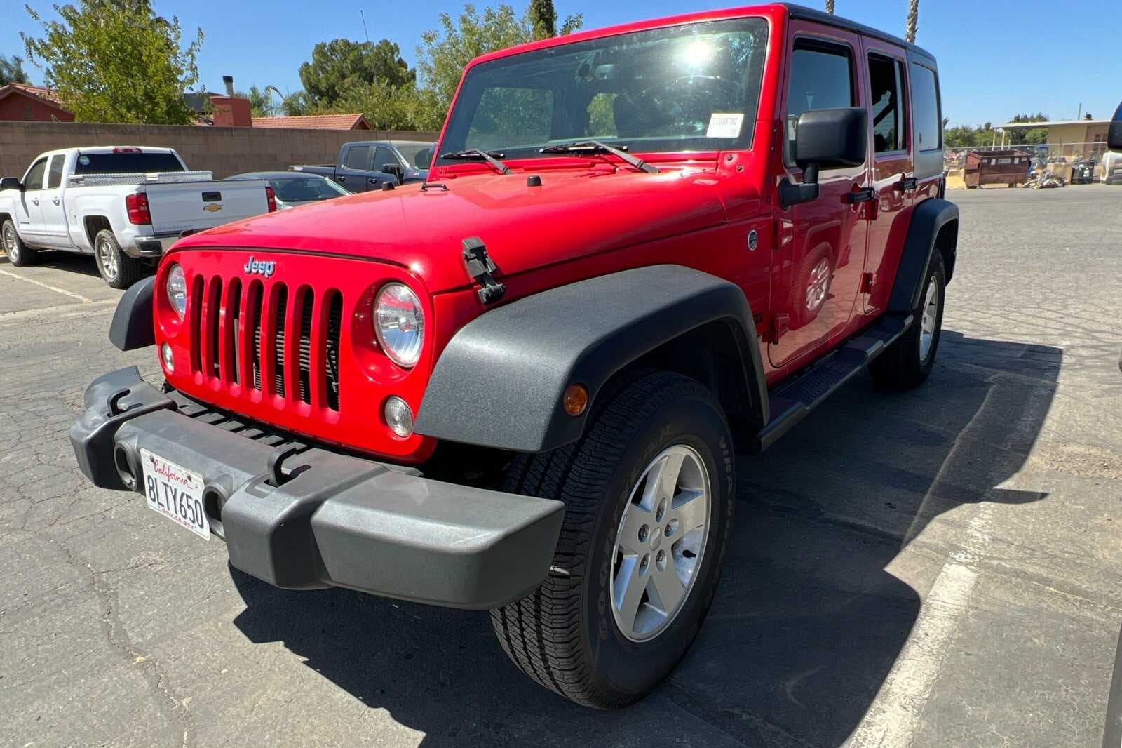 Used 2015 Jeep Wrangler Unlimited Sport with VIN 1C4HJWDG5FL709878 for sale in Madera, CA