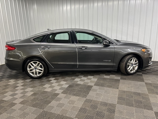 Used 2019 Ford Fusion Hybrid Titanium with VIN 3FA6P0RU4KR265931 for sale in Ithaca, NY