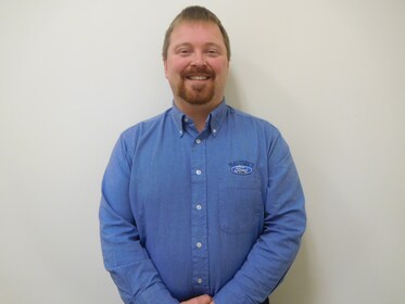 Staff member Chuck Clouser from 658e0157a21c