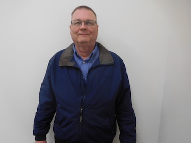 Staff member Steve Smiley from 658e0157a21c