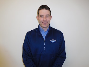 Staff member Michael McCormack from 658e0157a21c