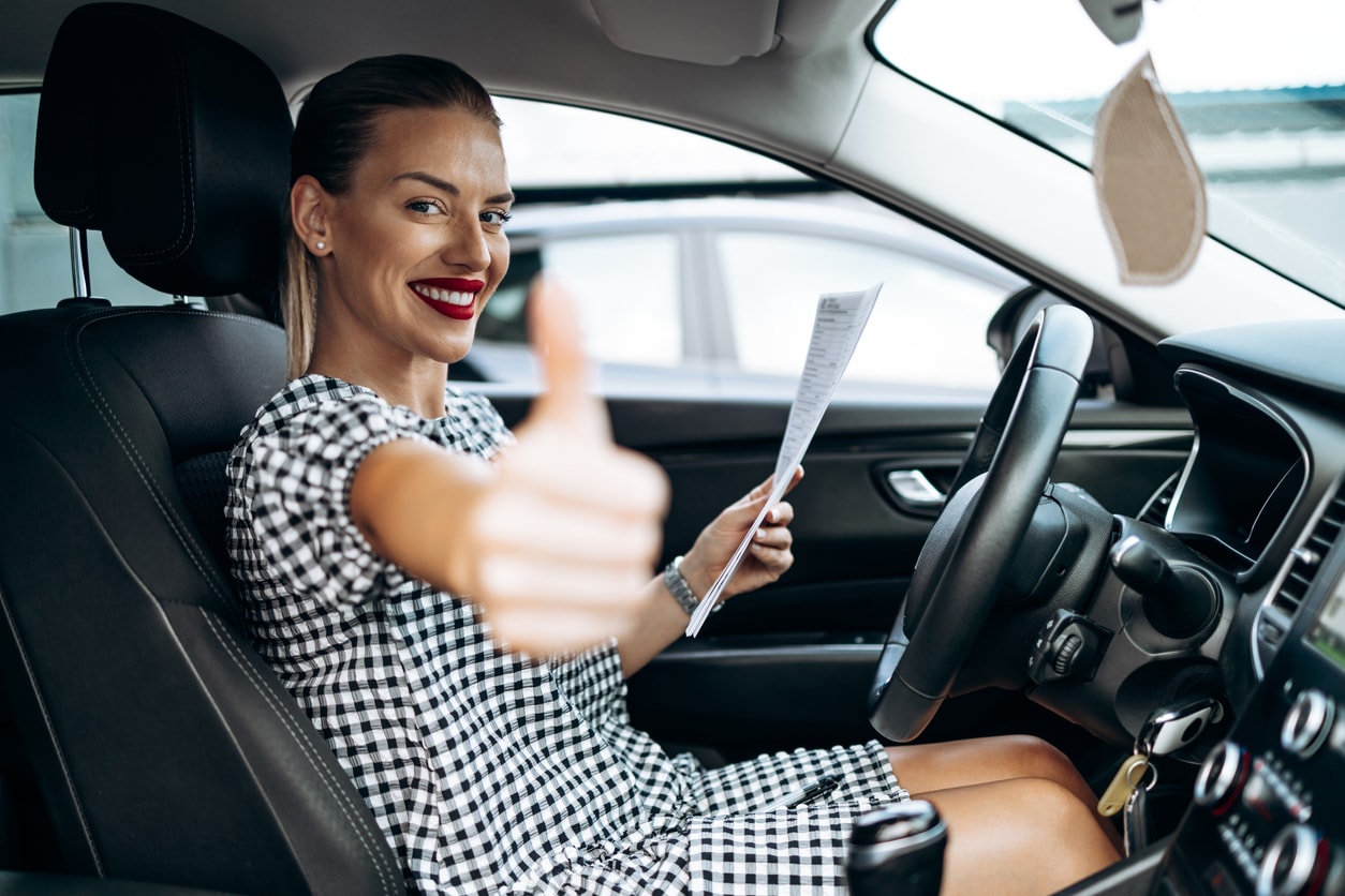 Woman examining a used car at Maguire's Ford Duncannon
