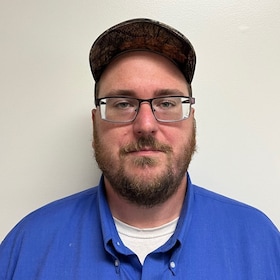 Staff member Tom Briggs from 9951b2890aad