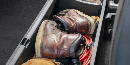 partitioned lockable under-seat storage