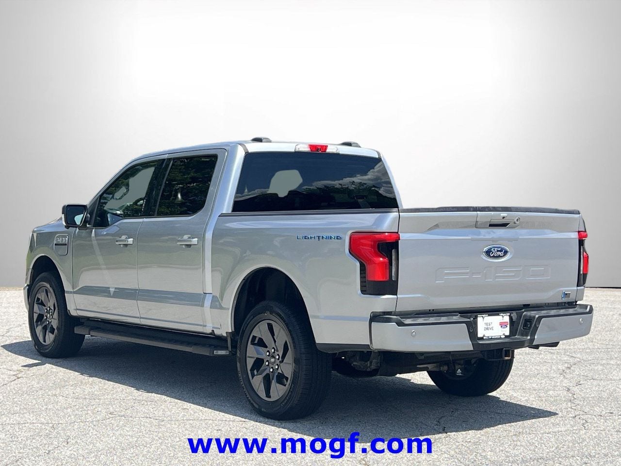 Used 2023 Ford F-150 Lightning XLT with VIN 1FTVW1EV7PWG36128 for sale in Sugar Hill, GA