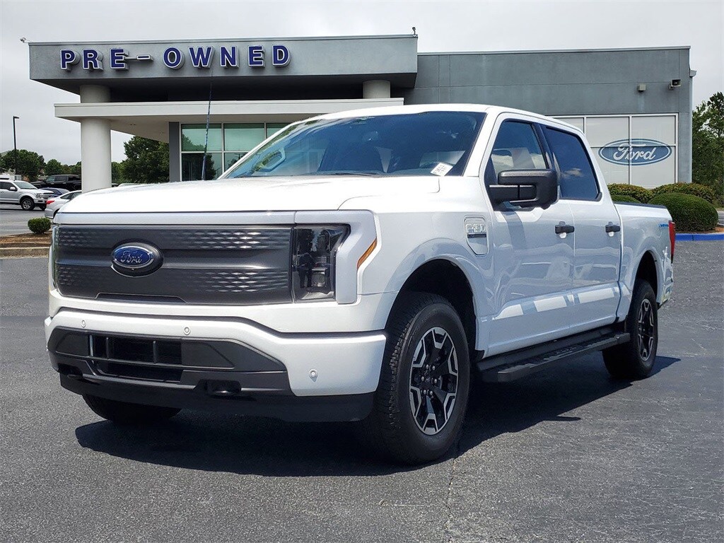 Used 2023 Ford F-150 Lightning XLT with VIN 1FTVW1ELXPWG04949 for sale in Buford, GA