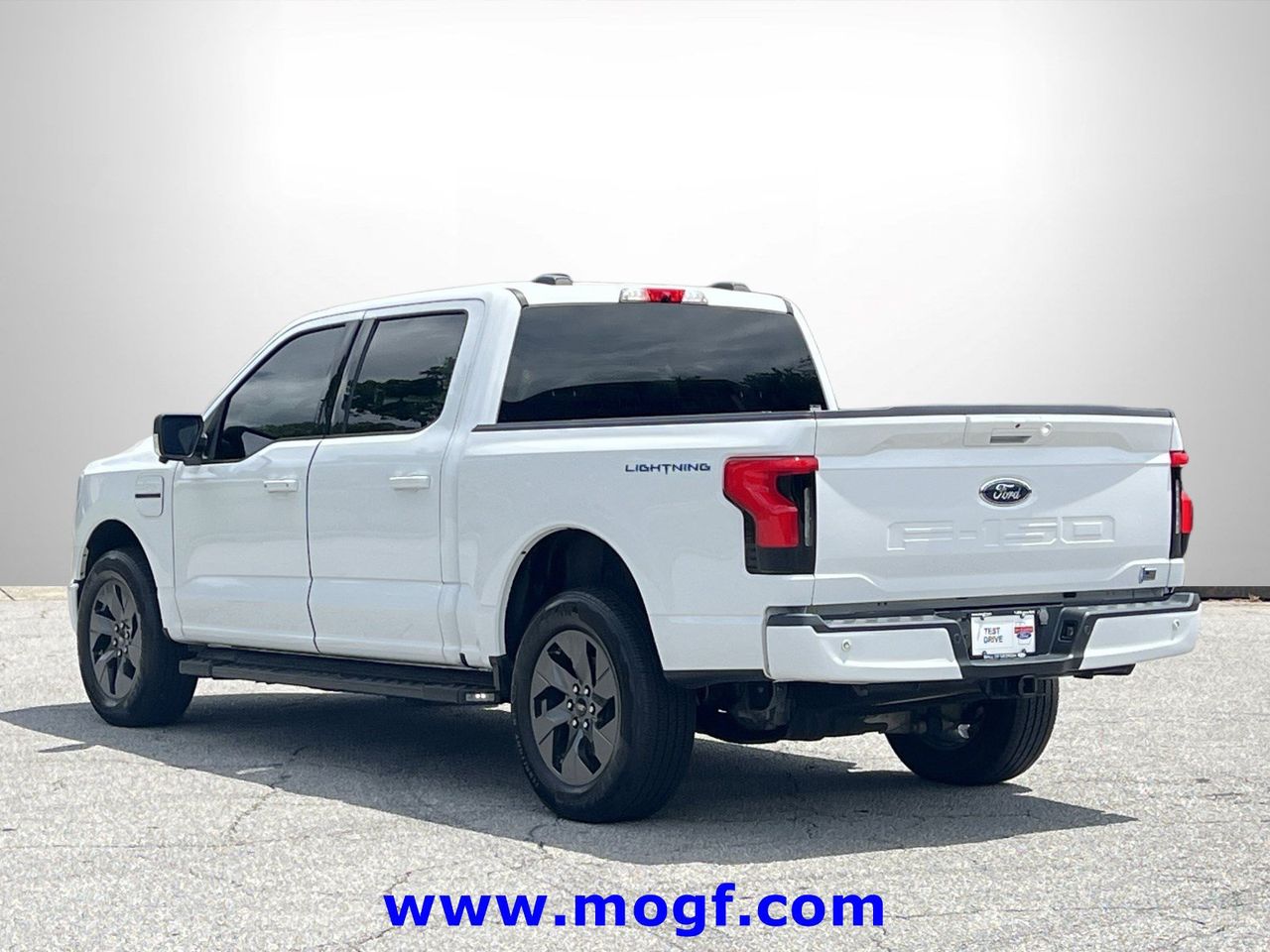 Certified 2023 Ford F-150 Lightning XLT with VIN 1FT6W1EV2PWG50720 for sale in Sugar Hill, GA