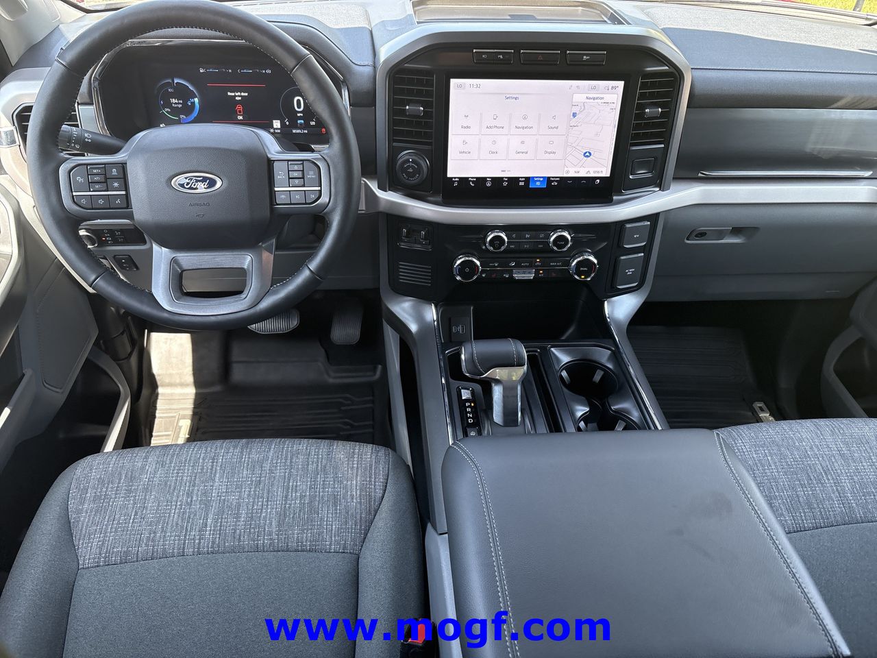 Used 2023 Ford F-150 Lightning XLT with VIN 1FTVW1EVXPWG36186 for sale in Sugar Hill, GA