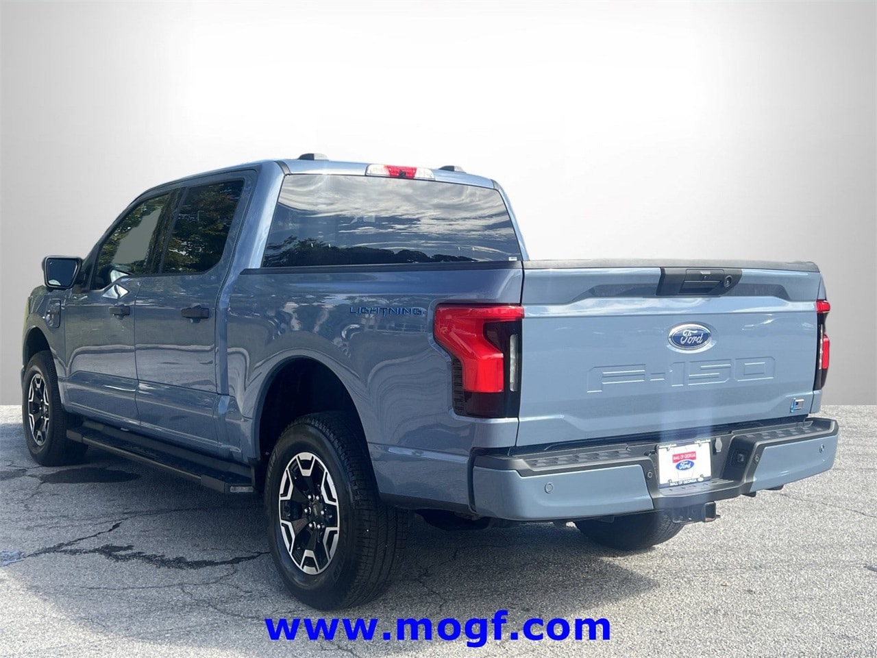 Certified 2023 Ford F-150 Lightning XLT with VIN 1FTVW1EL3PWG10902 for sale in Sugar Hill, GA